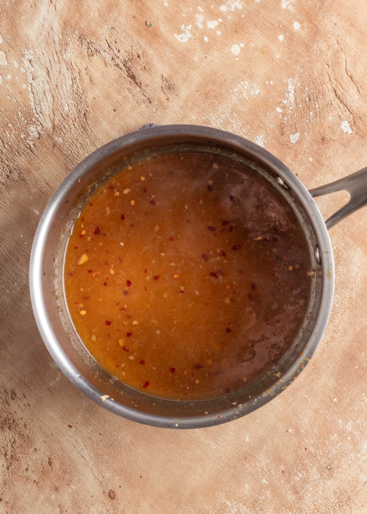 orange maple glaze in a stainless steel pot