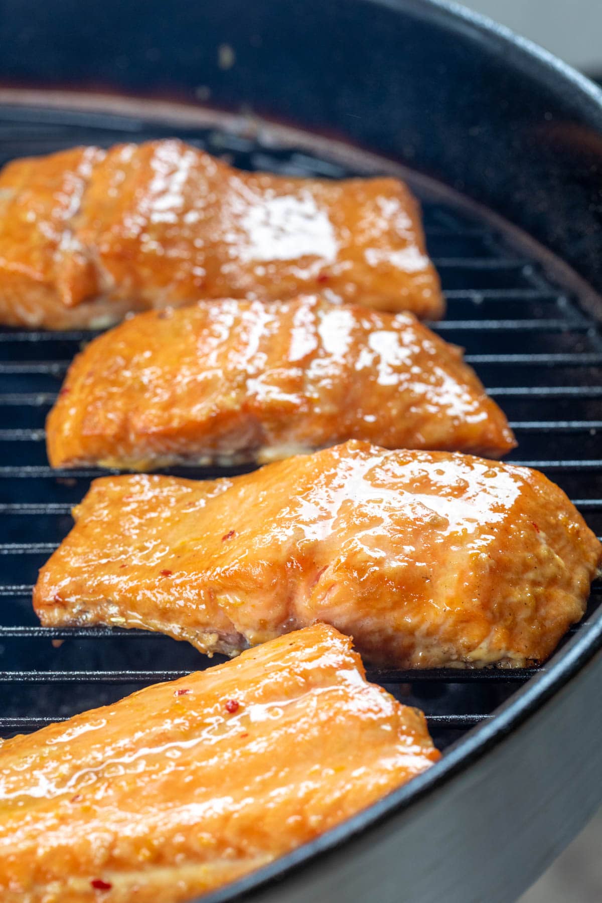 smoked salmon fillets with orange maple bourbon glaze on a pellet grill
