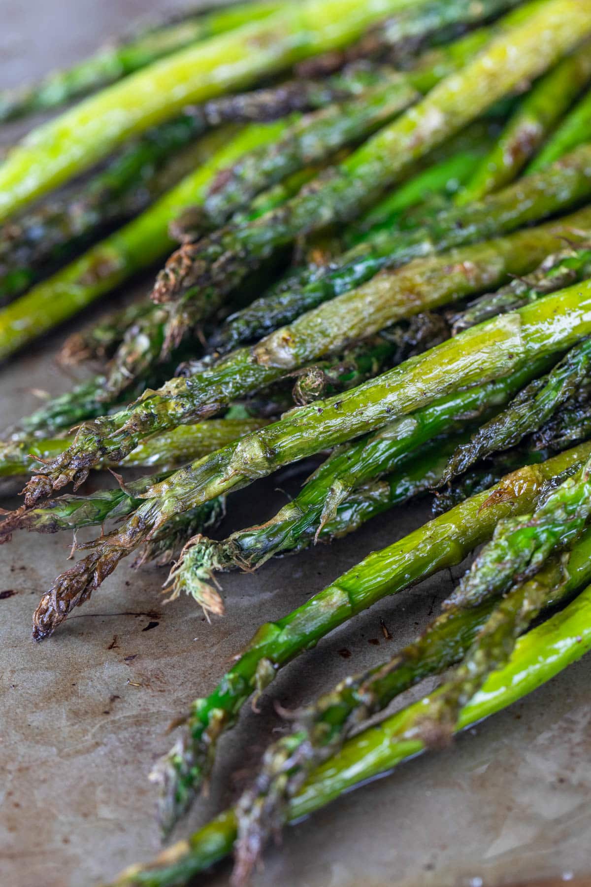 closeup of smoked asparagus on a baking sheet