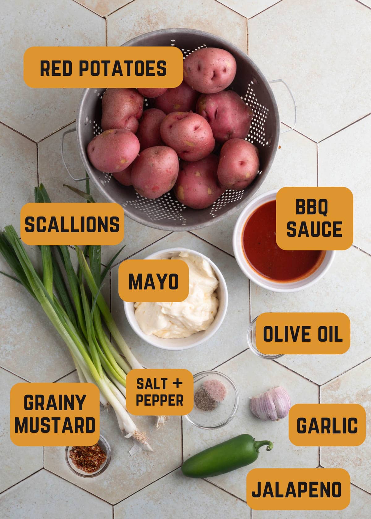 overhead of ingredients needed for smoked BBQ potato salad on an ivory tile surface with text label overlays